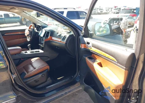 2013 Jeep Grand Cherokee Overland z USA, uszkodzony, nr VIN 1C4RJFCT0DC652134